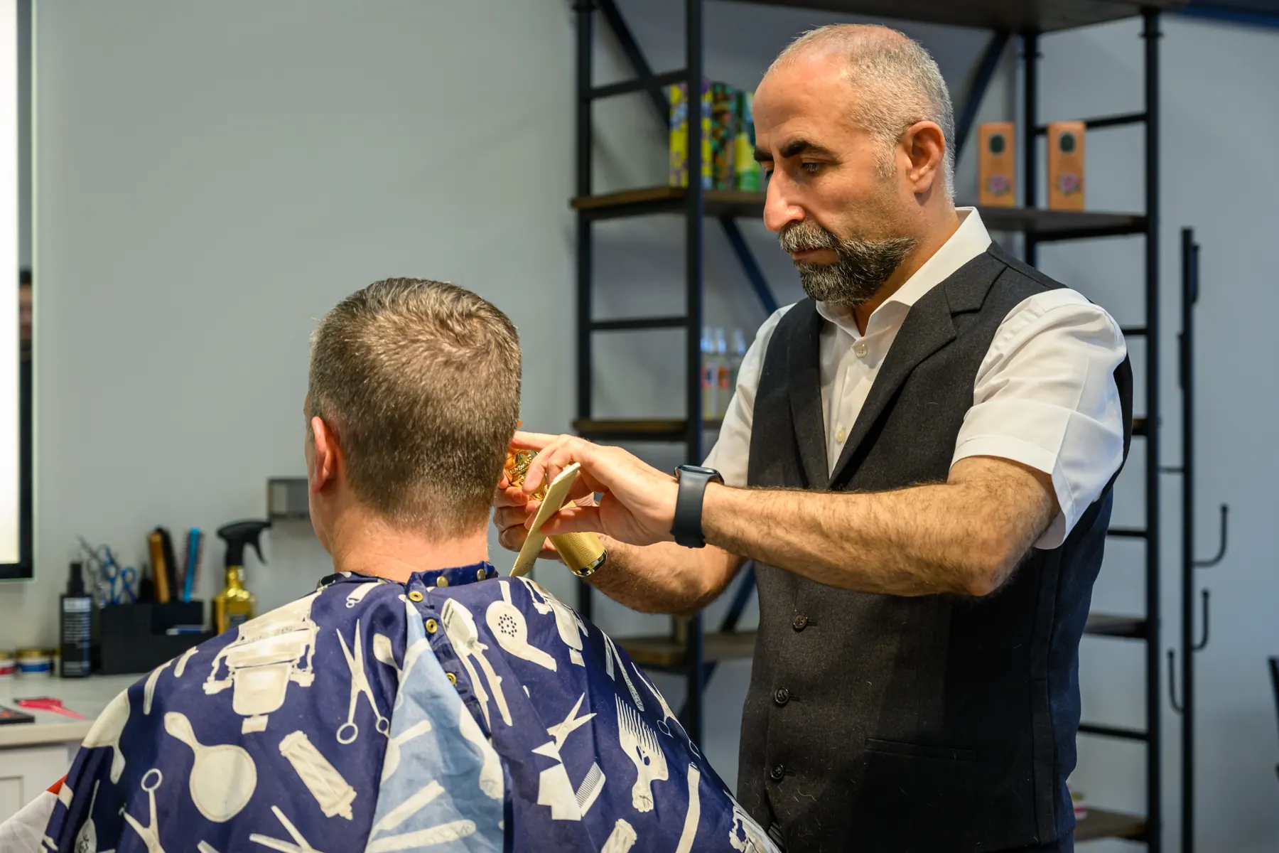Classic haircut in progress at the station